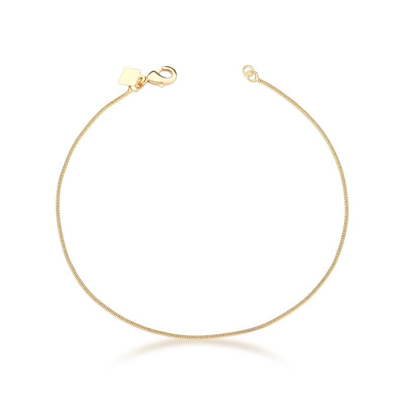 Tornozeleira fina banhada a ouro, comprimento 22cm, largura 1mm, com tecnologia antialérgica. Semijoias antialérgicas elegantes.