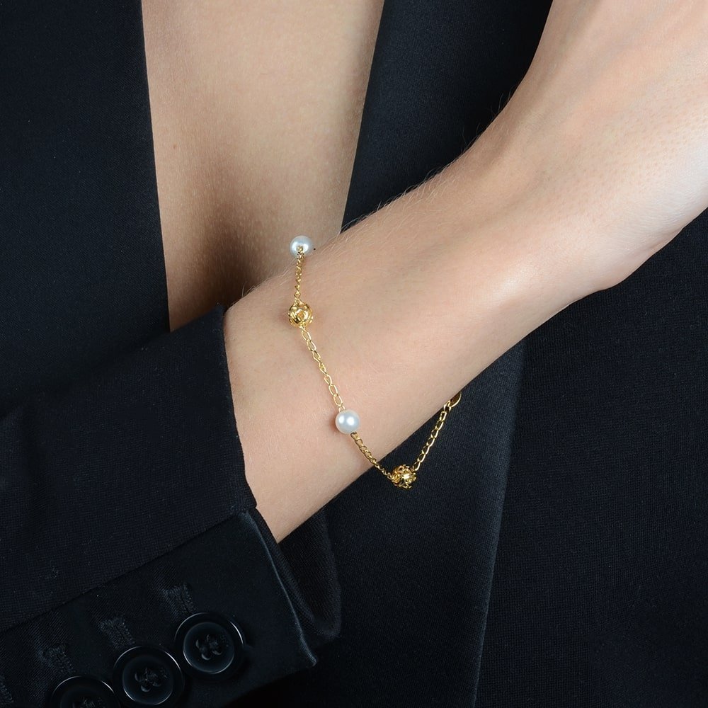 Pulseira Esferas Vazadas e Pérolas