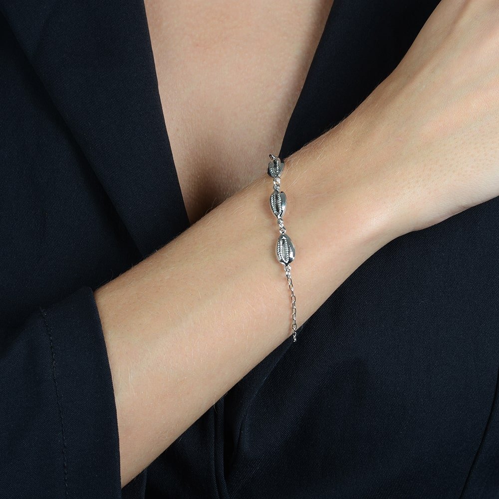 Pulseira Búzios e Proteção Prateada